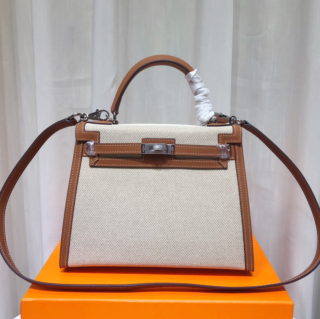 Kelly 25 Bag With Outside Stitching Constructed Of Patchwork Canvas & Premium Soft Swift Leather, Rich Warm Brown Tone Delivers Full-Bodied Vintage Luxury Texture Dimensions: Length 25 * Width 10 * Height 18cm